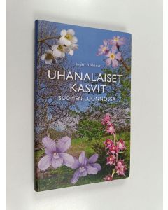 Kirjailijan Jouko Rikkinen käytetty kirja Uhanalaiset kasvit Suomen luonnossa