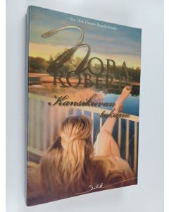 Kirjailijan Nora Roberts käytetty kirja Kansikuvan takana