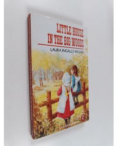 Kirjailijan Laura Ingalls Wilder käytetty kirja Little House in the Big Woods