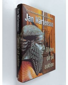 Kirjailijan Jan Mårtenson käytetty kirja Döden går på auktion