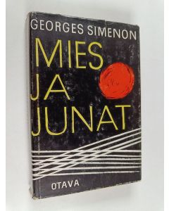 Kirjailijan Georges Simenon käytetty kirja Mies ja junat