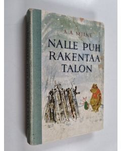 Kirjailijan A. A. Milne käytetty kirja Nalle Puh rakentaa talon