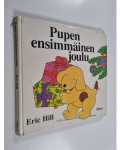 Kirjailijan Eric Hill käytetty kirja Pupen ensimmäinen joulu