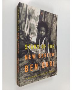 Kirjailijan Ben Okri käytetty kirja Stars of the New Curfew