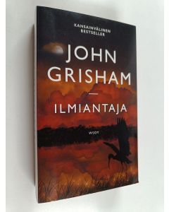 Kirjailijan John Grisham käytetty kirja Ilmiantaja