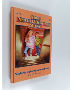 Kirjailijan Ann M. Martin käytetty kirja Violetin kotona kummittelee