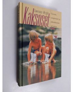 Kirjailijan Lawrence Wright käytetty kirja Kaksoset : geenit, ympäristö ja identiteetin arvoitus