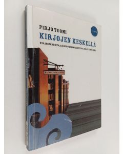 Kirjailijan Pirjo Tuomi käytetty kirja Kirjojen keskellä kirjastonhoitaja kaunokirjallisuuden asiantuntijana