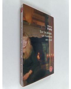 Kirjailijan Marina Vlady käytetty kirja Sur La Plage Un Homme En Noir