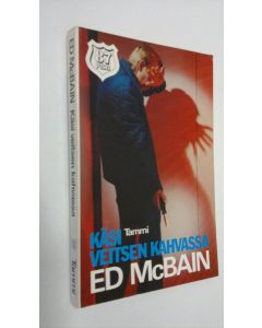 Kirjailijan Ed McBain käytetty kirja Käsi veitsen kahvassa