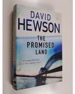 Kirjailijan David Hewson käytetty kirja The Promised Land