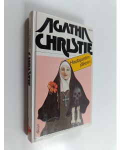 Kirjailijan Agatha Christie käytetty kirja Hautajaisten jälkeen