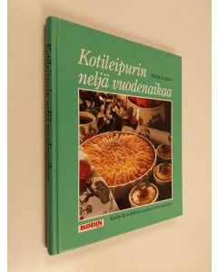 Kirjailijan Marita Joutjärvi käytetty kirja Kotileipurin neljä vuodenaikaa : Kodin kuvalehden parhaat leivontaohjeet