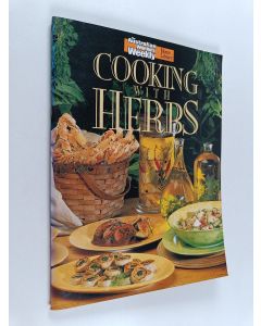Kirjailijan Maryanne Blacker käytetty teos Cooking with Herbs