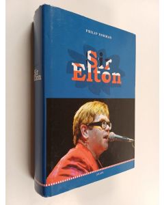 Kirjailijan Philip Norman käytetty kirja Sir Elton : Elton Johnin elämäkerta