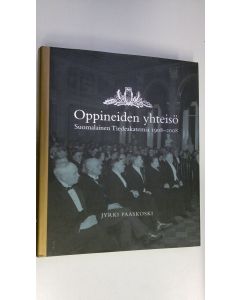 Kirjailijan Jyrki Paaskoski käytetty kirja Oppineiden yhteisö : Suomalainen tiedeakatemia 1908-2008