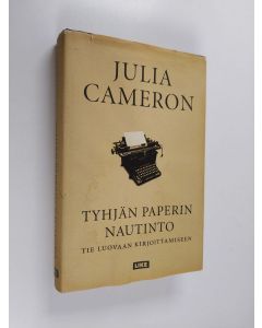 Kirjailijan Julia Cameron käytetty kirja Tyhjän paperin nautinto - tie luovaan kirjoittamiseen