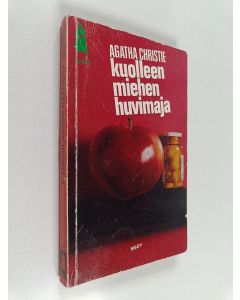 Kirjailijan Agatha Christie käytetty kirja Kuolleen miehen huvimaja