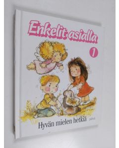 Kirjailijan Anne Ashleigh Abraham käytetty kirja Hyvän mielen hetkiä
