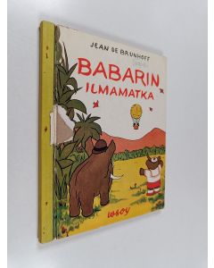 Kirjailijan Jean de Brunhoff käytetty kirja Babarista tulee kuningas ; Babarin ilmamatka