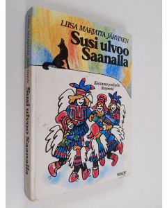 Kirjailijan Liisa Marjatta Järvinen käytetty kirja Susi ulvoo Saanalla : kertomus jouluyön ihmeestä