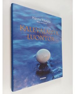 Kirjailijan Hannu Hautala käytetty kirja Kalevalaista luontoa : Tapion karjaa : luonto ja eläimet vanhan kansan sananparsissa