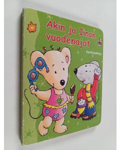 Kirjailijan Anne Tromme käytetty kirja Akin ja Iinan vuodenajat : kurkistuskirja