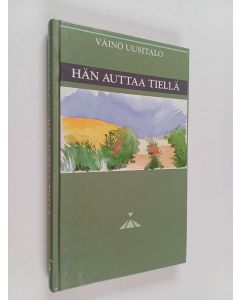 Kirjailijan Väinö Uusitalo käytetty kirja Hän auttaa tiellä