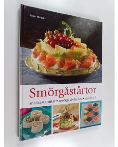 Kirjailijan Inger Bjugård käytetty kirja Smörgåstårtor : snacks, snittar, smörgåsbakelser, sandwich