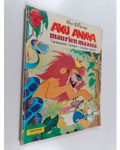 Kirjailijan Walt Disney käytetty kirja Aku Ankka maurien maassa : Tarasconin Tartarin - Sevillan parturi