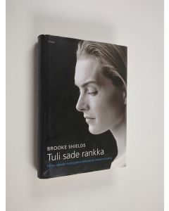 Kirjailijan Brooke Shields käytetty kirja Tuli sade rankka : miten selvisin synnytyksenjälkeisestä masennuksesta