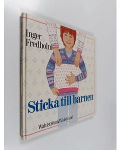 Kirjailijan Inger Fredholm käytetty kirja Sticka till barnen : tröjor, mössor, vantar och sockor för barn upp till 12 år : beskrivningar, mönsterdiagram, stickråd