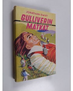 Kirjailijan Jonathan Swift käytetty kirja Gulliverin matkat kääpiöiden ja jättiläisten luo