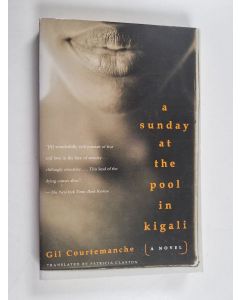 Kirjailijan Gil Courtemanche käytetty kirja A Sunday at the Pool in Kigali