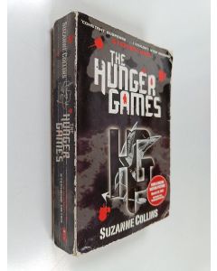 Kirjailijan Suzanne Collins käytetty kirja The Hunger Games