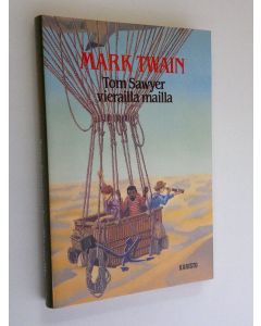 Kirjailijan Mark Twain käytetty kirja Tom Sawyer vierailla mailla