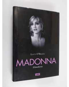 Kirjailijan Lucy O'Brien käytetty kirja Madonna : elämäkerta