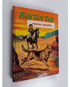 Kirjailijan Doris Schroeder käytetty kirja Rin-Tin-Tin vaaran poluilla