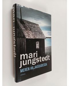 Kirjailijan Mari Jungstedt käytetty kirja Meren hiljaisuudessa