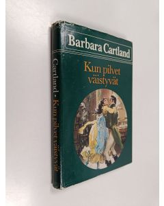 Kirjailijan Barbara Cartland käytetty kirja Kun pilvet väistyvät