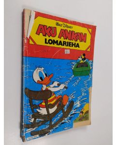 Kirjailijan Walt Disney käytetty kirja Aku Ankan lomarieha