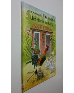 Kirjailijan Sven Nordqvist käytetty kirja Findus und der Hahn im Korb (ERINOMAINEN)