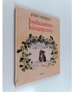 Kirjailijan James Herriot käytetty kirja Jouluaamun kissanpentu