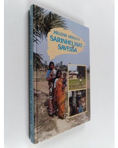 Kirjailijan Helena Herlevi käytetty kirja Sarinhelmat savessa : tie Bangladeshin oraonheimon luo