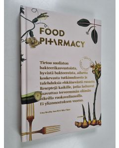 Kirjailijan Lina Nertby Aurell käytetty kirja Food PI+\rmacy : tietoa suoliston bakteerikasvustoista, hyvistä bakteereista, aihetta koskevasta tutkimuksesta ja tulehdusta ehkäisevästä ruoasta Reseptejä kaikille, jotka haluavat saavuttaa terveemmän elämän 