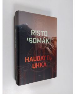 Kirjailijan Risto Isomäki käytetty kirja Haudattu uhka