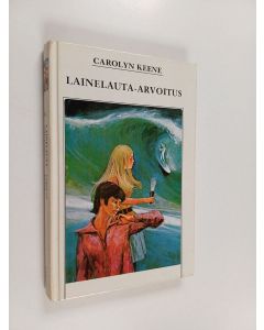 Kirjailijan Carolyn Keene käytetty kirja Lainelauta-arvoitus