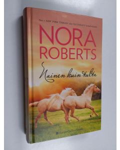 Kirjailijan Nora Roberts käytetty kirja Nainen kuin tulta