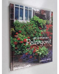 Kirjailijan Christa Holm käytetty kirja Kiehtovat pelargonit