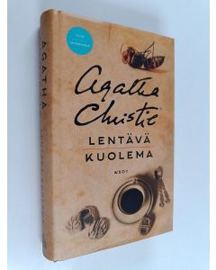 Kirjailijan Agatha Christie k&auml;ytetty kirja Lent&auml;v&auml; kuolema